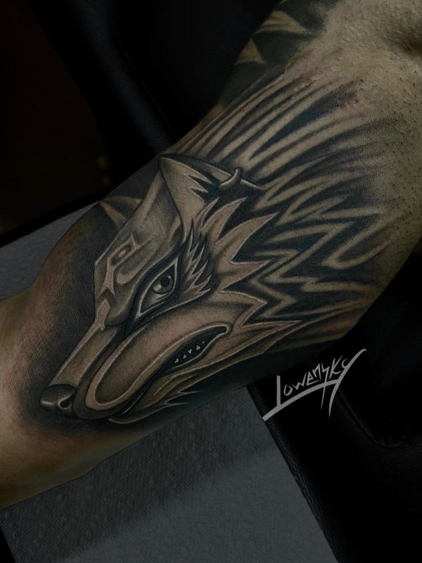 Black and grey Zelda wolf forearm tattoo by Lowensky Santiago, tattoo artist at Sacred Mandala Studio in Durham, NC.